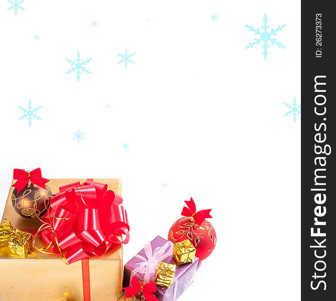 Christmas gift and balls with snow on white background