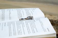 Wedding Rings On A Bible Stock Images