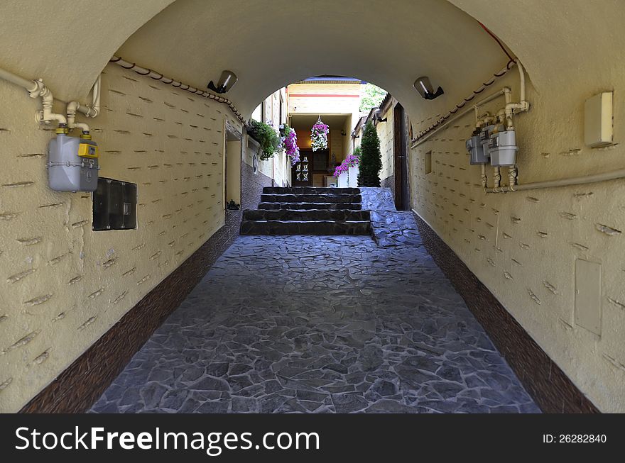 Narrow street tunnel to interior garden. Narrow street tunnel to interior garden