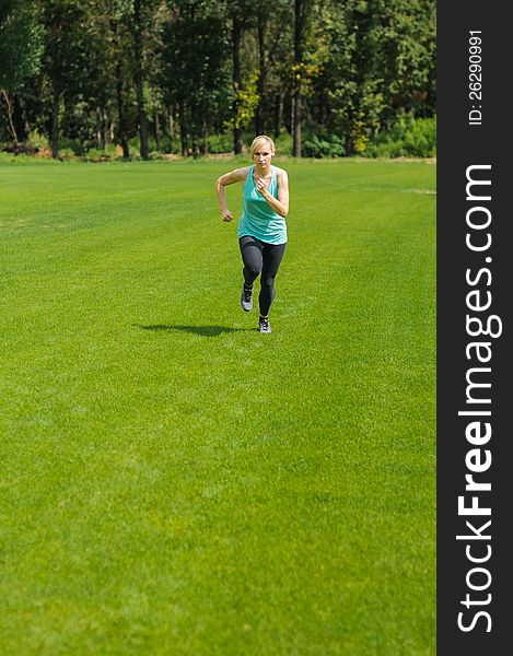 Portrait of a young woman jogging