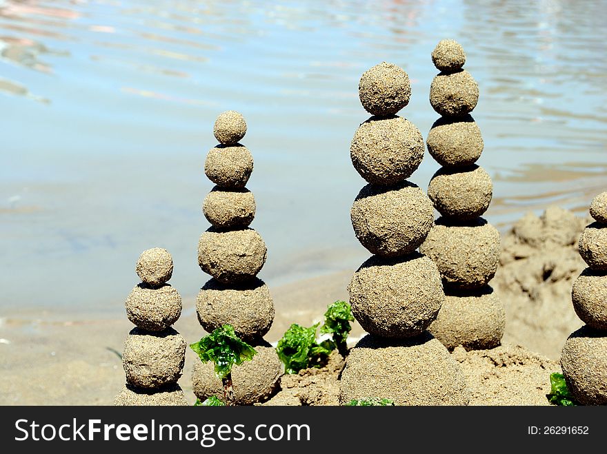 Sand balls on the beach, concept of balance