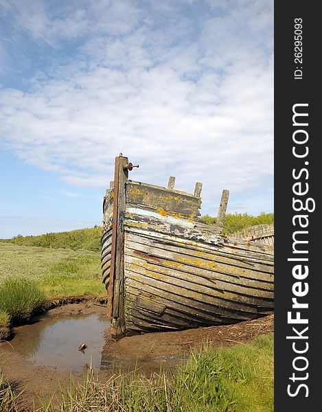 Remains of fishing boat on Norfolk coast at Blakeney. Remains of fishing boat on Norfolk coast at Blakeney