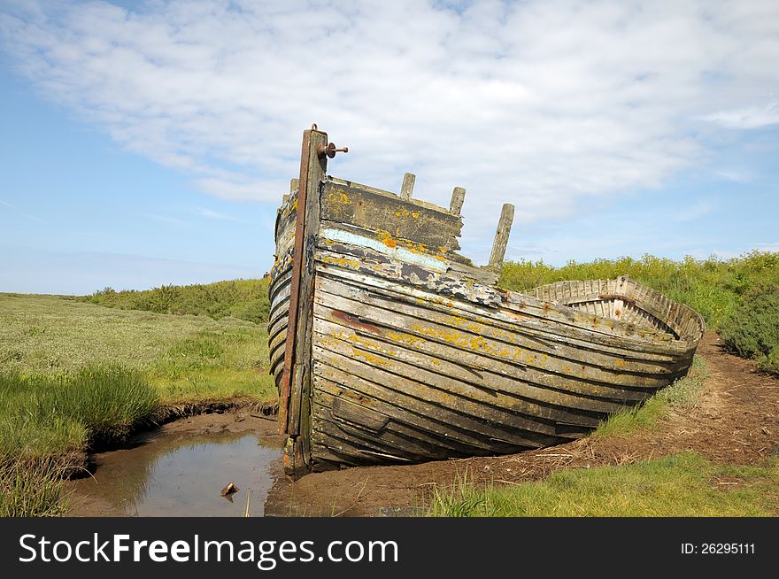 Remains of fishing boat on Norfolk coast at Blakeney. Remains of fishing boat on Norfolk coast at Blakeney