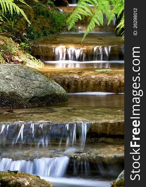 Beautiful veil cascading waterfalls, mossy rocks