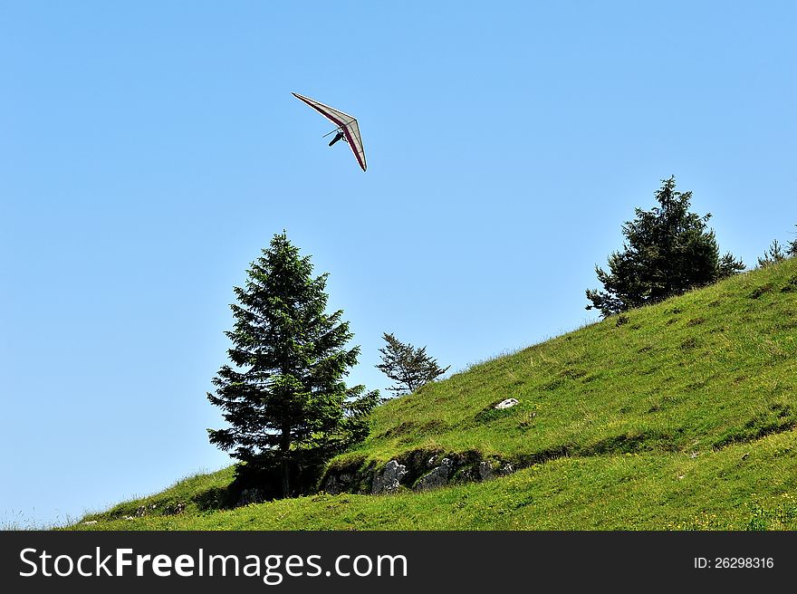 Gliding flying with the background of sky and clouds. Gliding flying with the background of sky and clouds