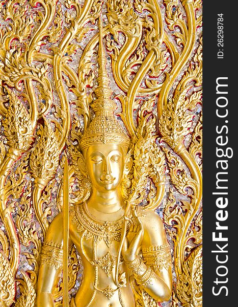 The Angel of Thai stucco covered with gold. The Angel of Thai stucco covered with gold.