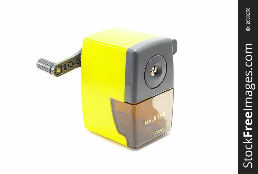 Yellow sharpener on a white background