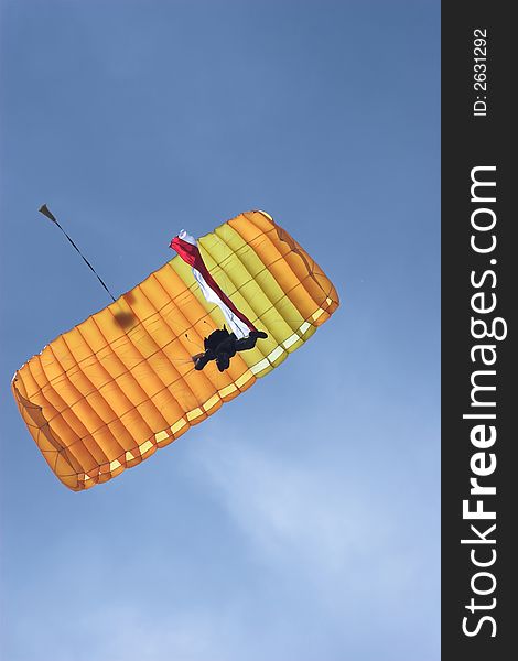 Skydiver against a cloudy sky