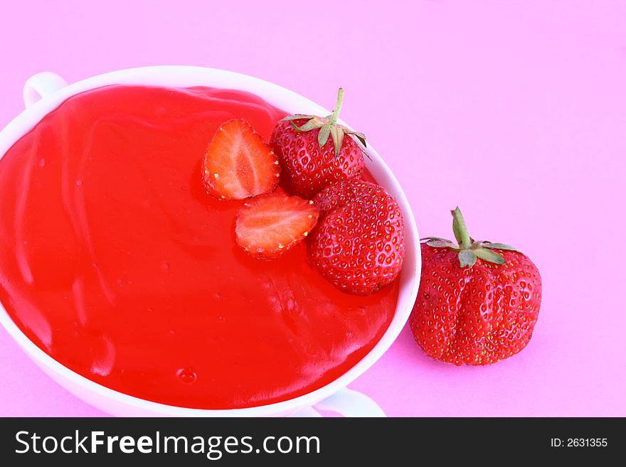 Strawberry Jam on a white background-red strawberry. Strawberry Jam on a white background-red strawberry