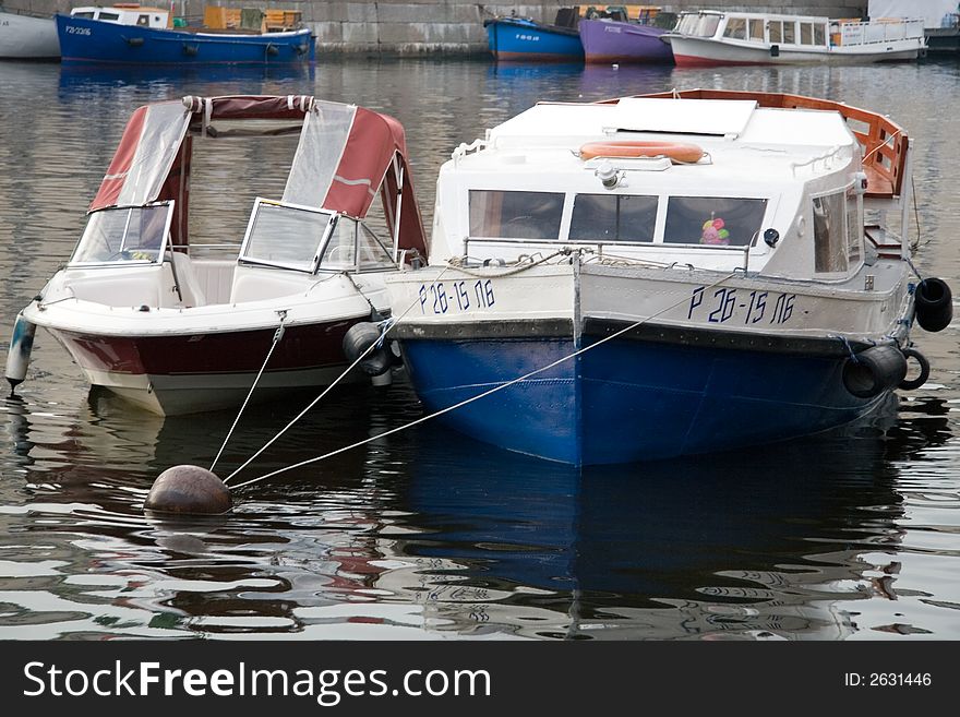 Small sailboats at the river