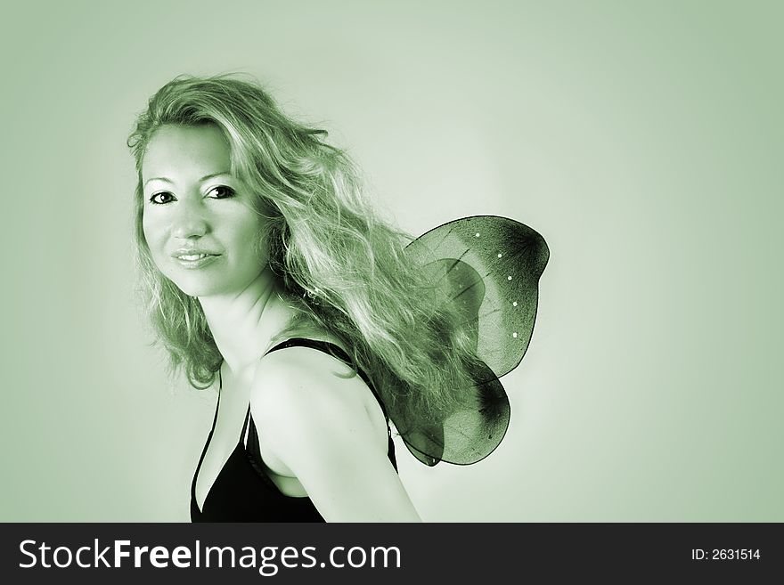 Beauty portrait of a young beautiful woman with butterfly wings. Beauty portrait of a young beautiful woman with butterfly wings
