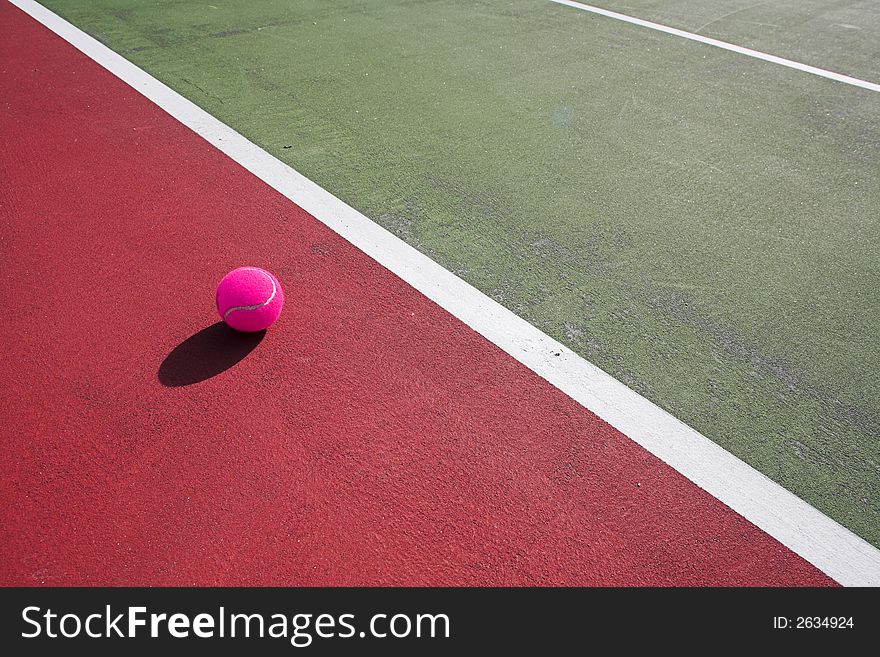 Colorful tennis court close up at day time