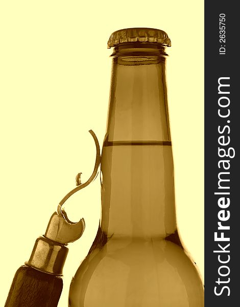 Bottle of beer and an opener on antique yellow background. Bottle of beer and an opener on antique yellow background.