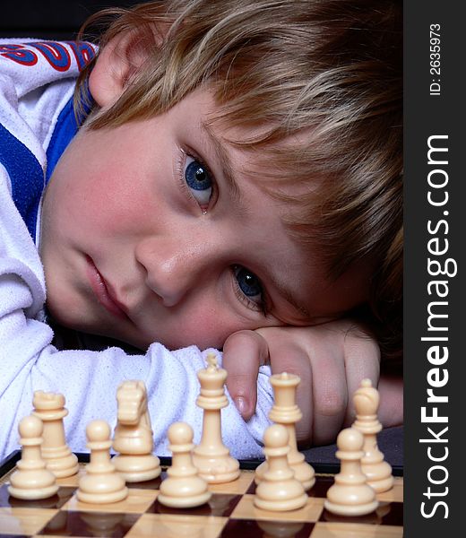 The small chessplayer with his play.
