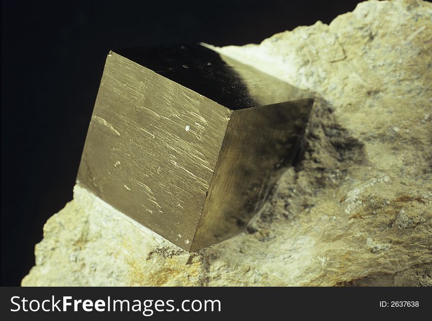 Close up of a pyrite mineral from NavajÃºn, Spain. Close up of a pyrite mineral from NavajÃºn, Spain