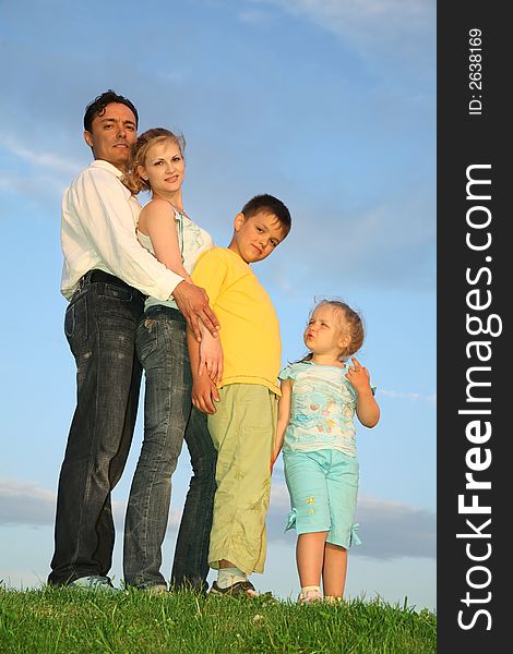 Family with two children against sky