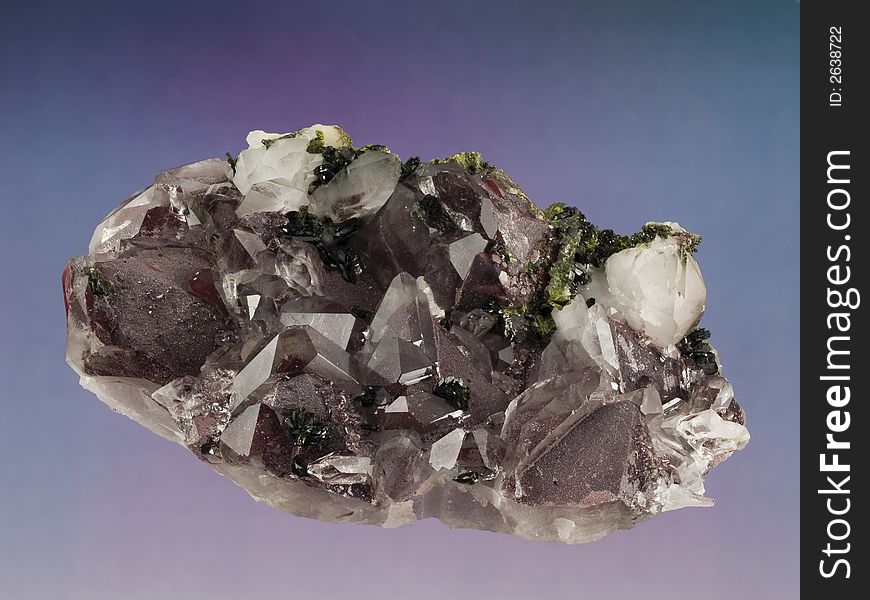 Close up of a peridote-muskovite mineral. Close up of a peridote-muskovite mineral.