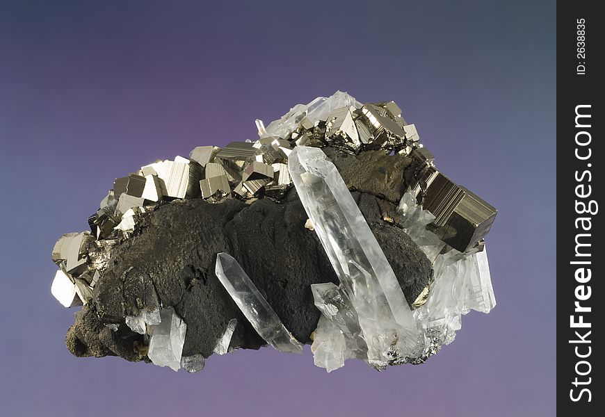 Close up of a pyrite and quartz mineral. Close up of a pyrite and quartz mineral.