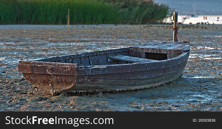 Boat aground at low tide. Boat aground at low tide