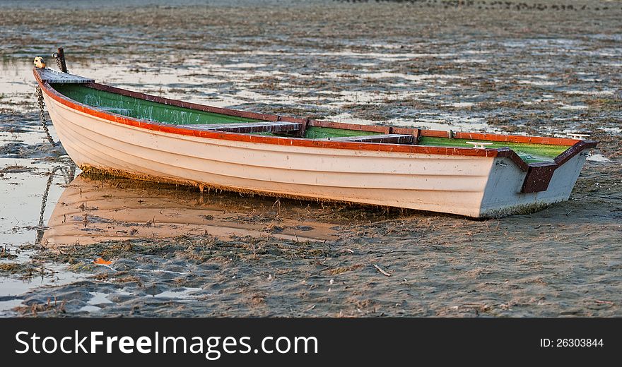 Boat aground at low tide. Boat aground at low tide
