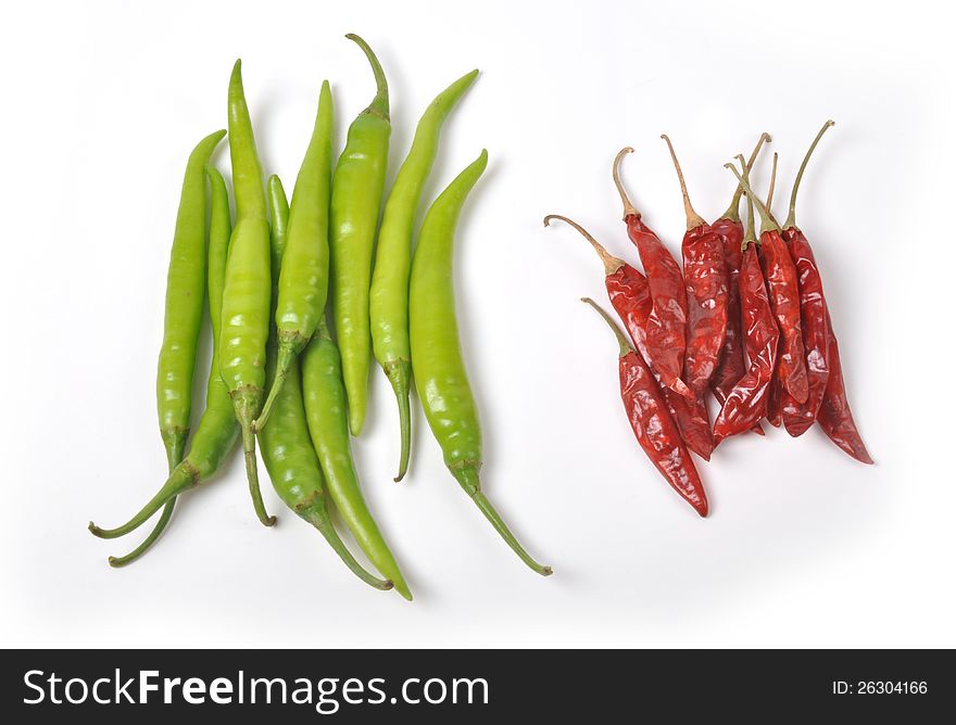 A bunch of hot and spicy dry red and green chillies