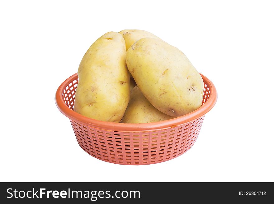 Raw Potatoes In Basket Isolated On White