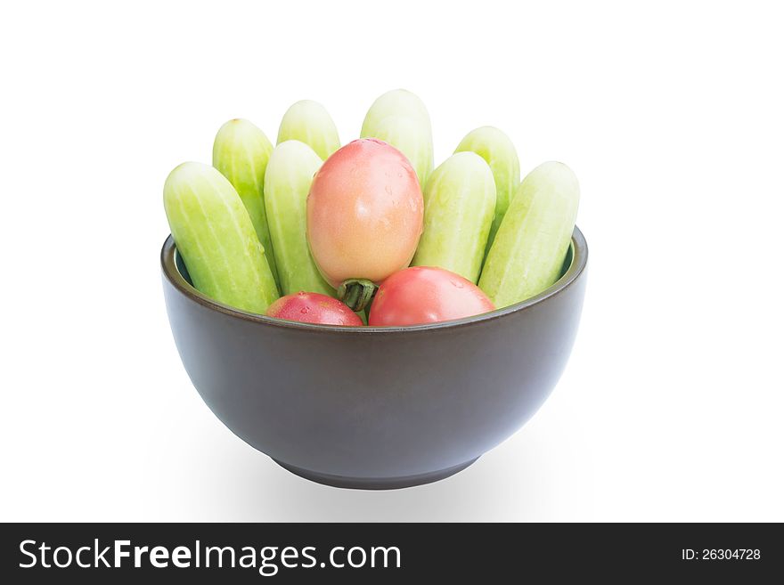 Cup Of  Tomatoes And CuCumbers   On White Background. Cup Of  Tomatoes And CuCumbers   On White Background