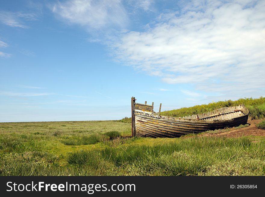 Remains of fishing boat on Norfolk coast at Blakeney. Remains of fishing boat on Norfolk coast at Blakeney