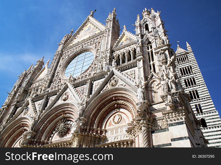 A church in Siena, Tuscany, Italy: The dome of Siena. A church in Siena, Tuscany, Italy: The dome of Siena.