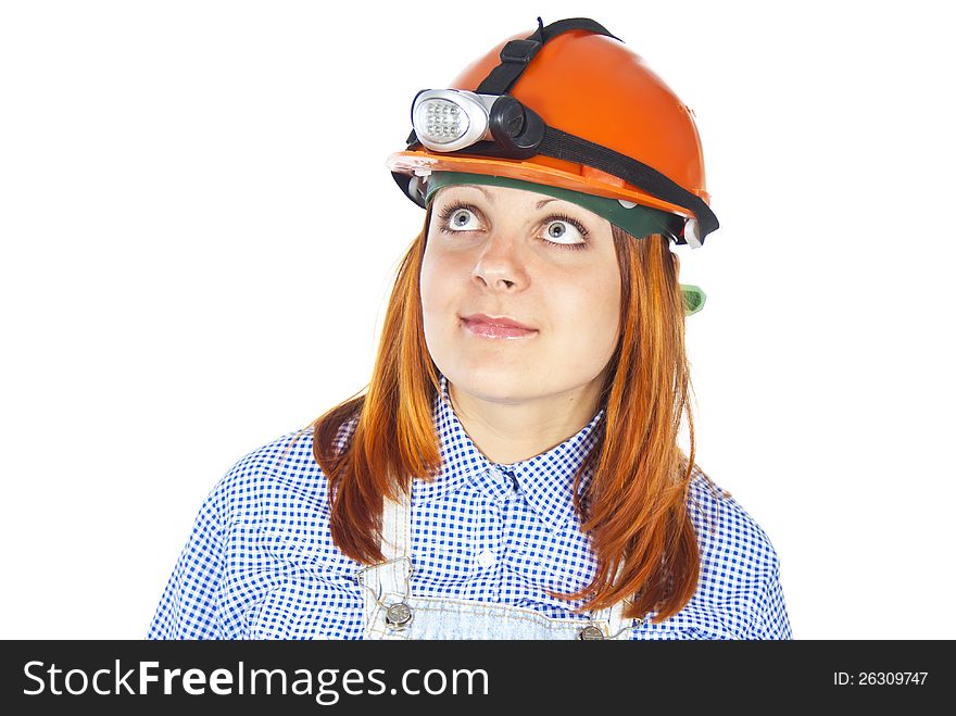 Girl worker in helmet observes