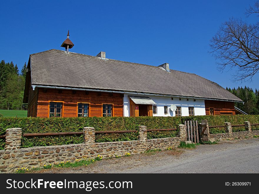 Very nice cottage on a secluded and blue sky in the background. Very nice cottage on a secluded and blue sky in the background