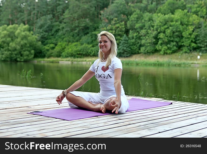 Woman meditates outdoors