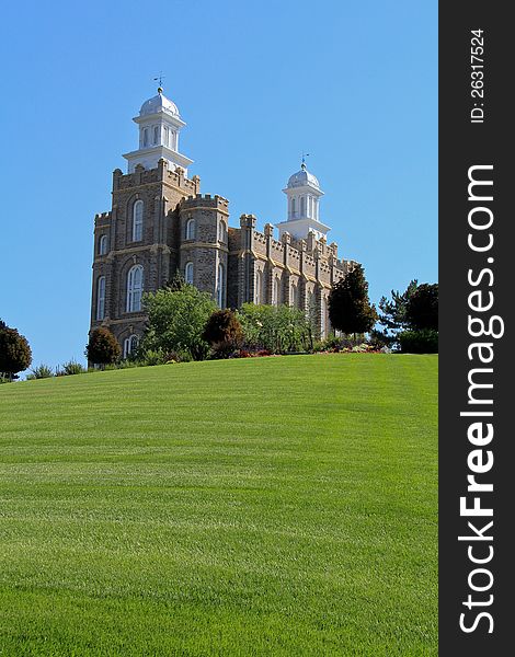 Image of the Logan Utah mormon temple with grass in the foreground - use for text