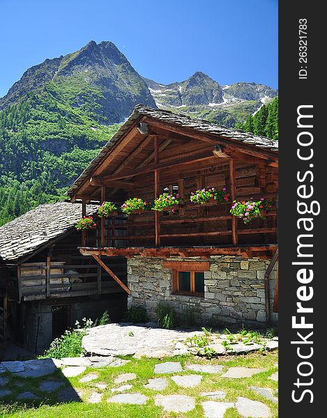 Traditional alpine architectute. Mountain houses in Alpenzu, Gressoney, Aosta Valley. Traditional alpine architectute. Mountain houses in Alpenzu, Gressoney, Aosta Valley.