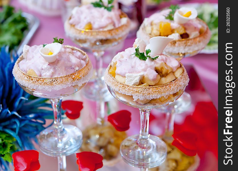 Dessert in a glass salad bowl on the holiday table