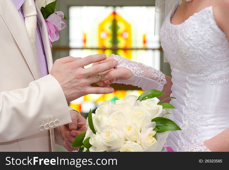 The solemn moment of a betrothal during wedding ceremony