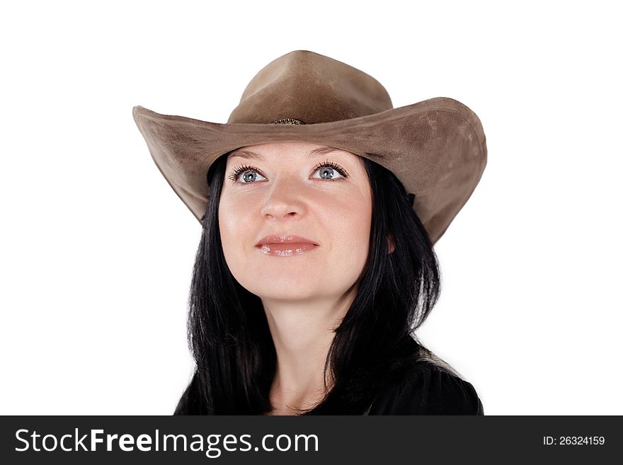 Portrait of a cute brunette girl in a hat isolated