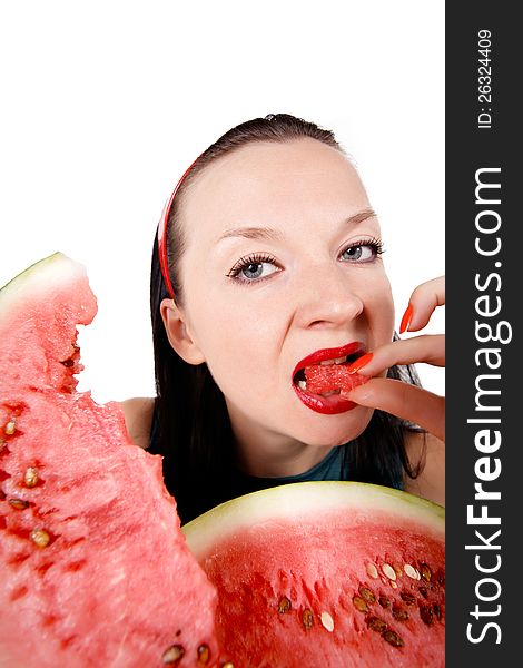 Brunette girl eating fresh watermelon isolated