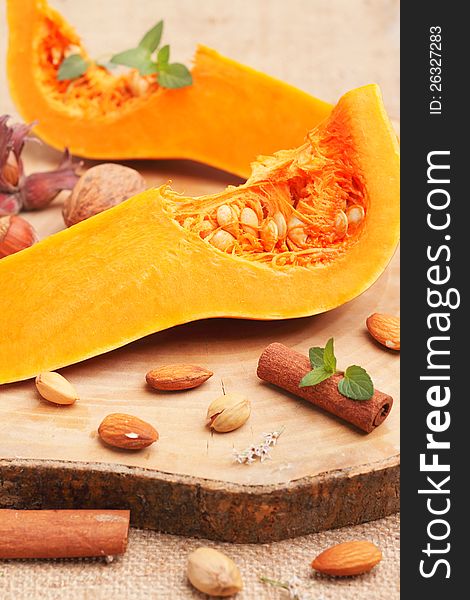 Slice of pumpkin with mix of nuts and spices. Slice of pumpkin with mix of nuts and spices