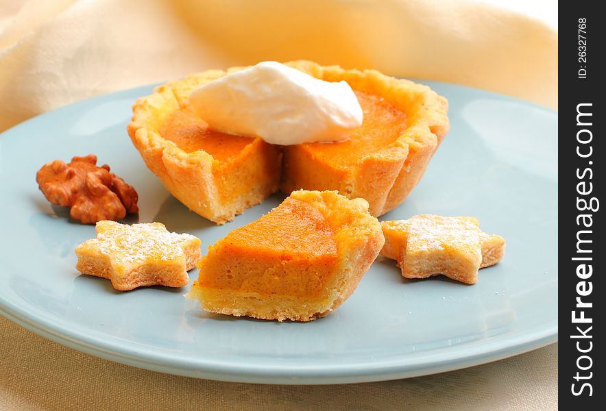 Homemade mini pumpkin pie with nuts. Homemade mini pumpkin pie with nuts