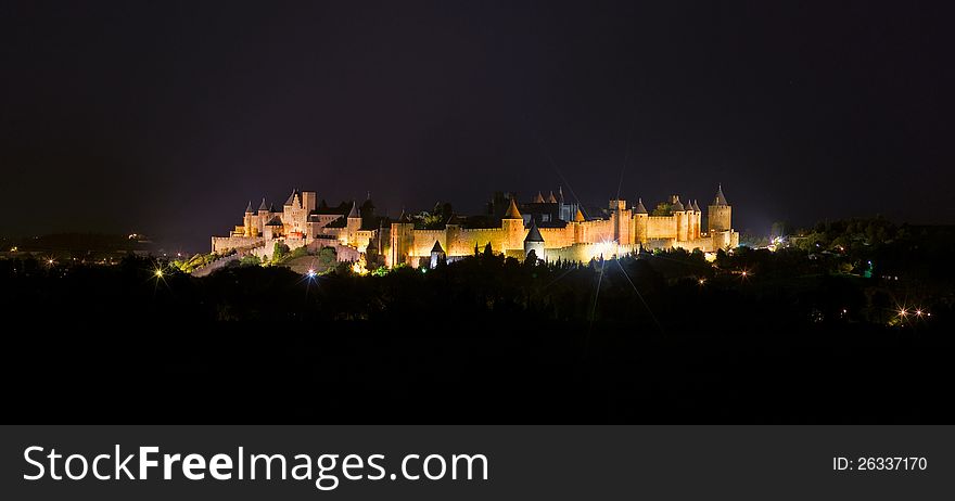 Carcassonne castle at night, view from highway