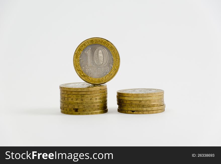 Two small piles of metal coins