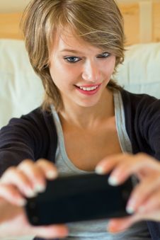 Blonde Woman Taking A Picture Of Her On The Mobile Stock Photos Blonde Woman Taking A Picture Of Her On The Mobile Stock Photos