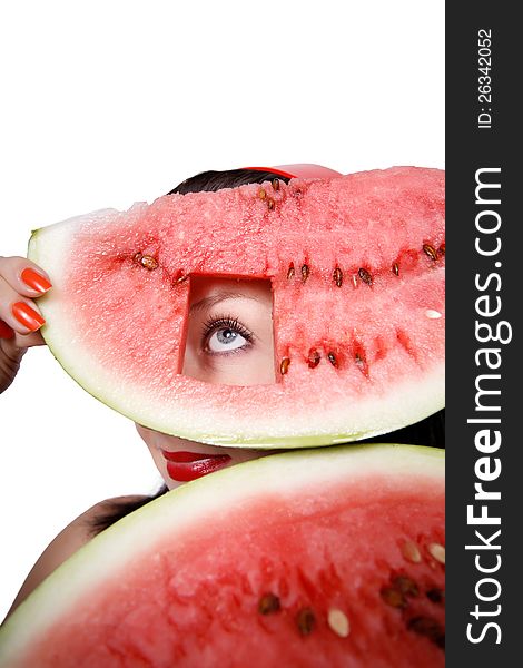 Her look through a hole in a watermelon