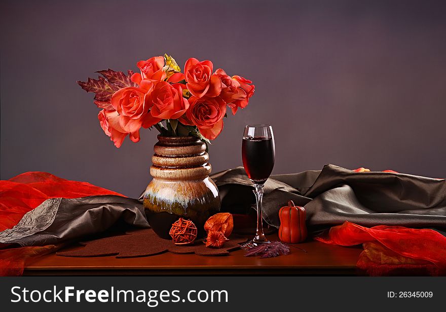 Still life with red wine and roses. Still life with red wine and roses