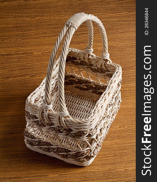 Square basket on the wood background