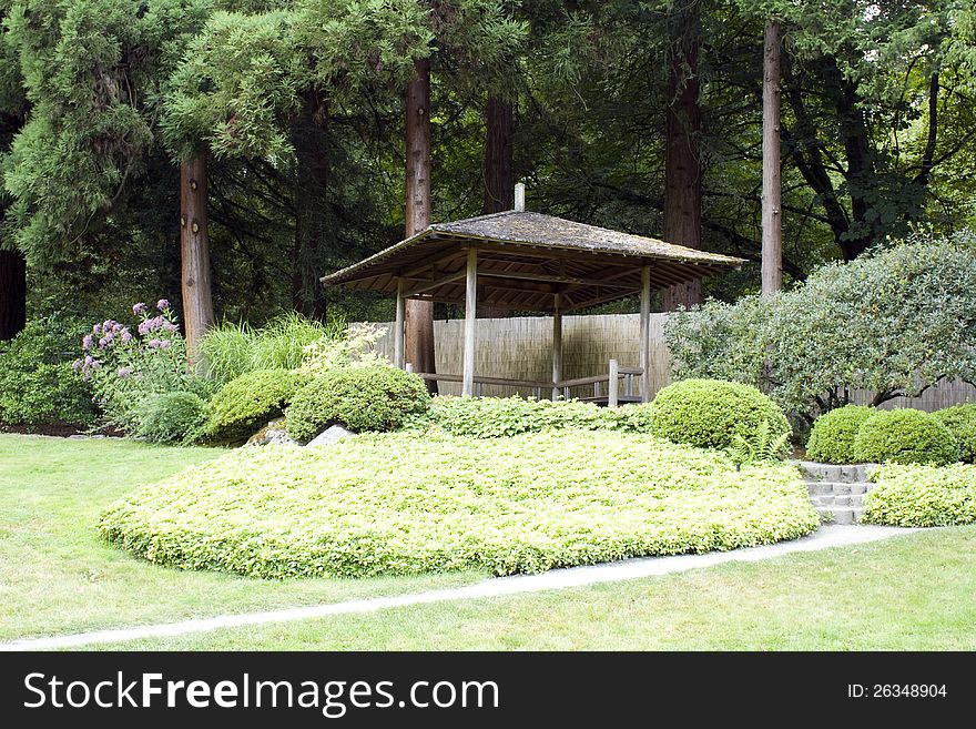 A traditional pavilion in a Japanese garden. A traditional pavilion in a Japanese garden