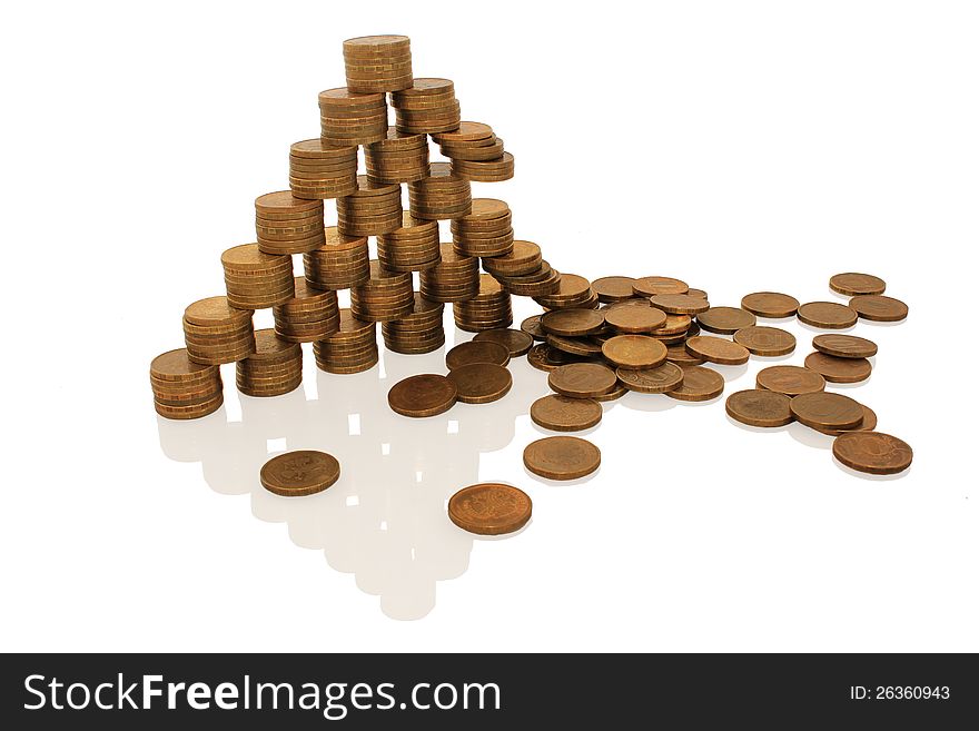 Ruined pyramid of coins, on white background. Ruined pyramid of coins, on white background