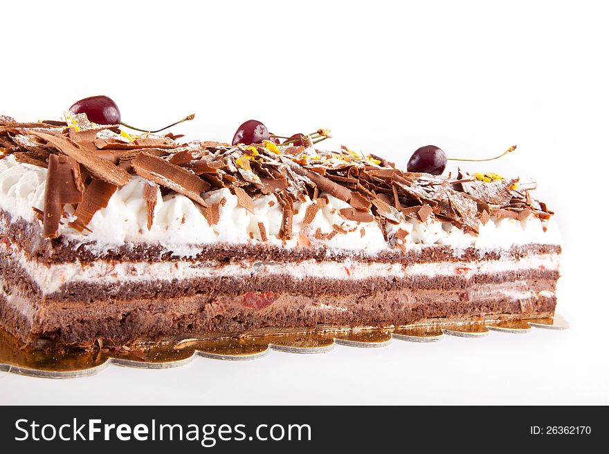 Chocolate Cake with white cream and Chocolate with Cherries. Chocolate Cake with white cream and Chocolate with Cherries