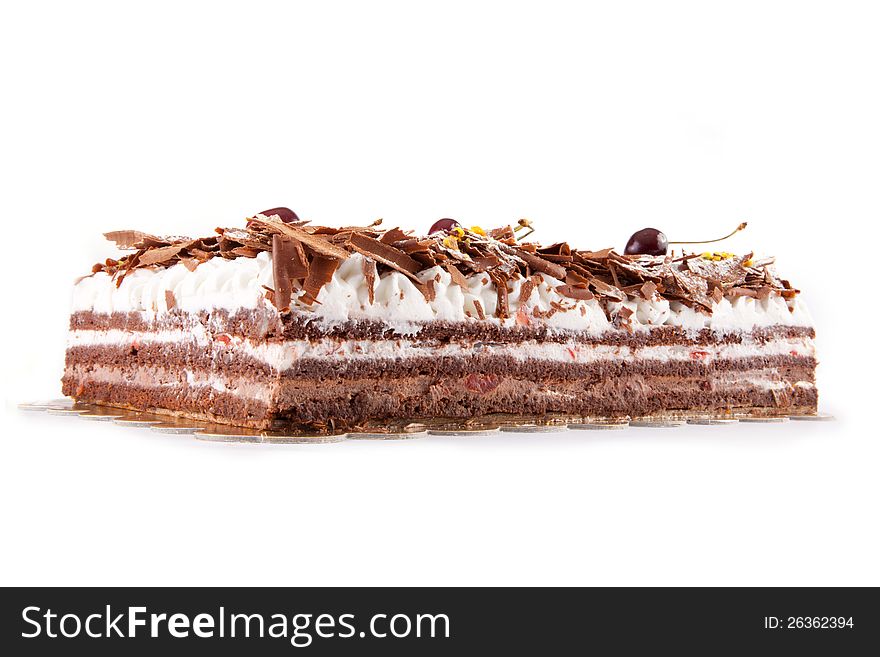 Chocolate Cake with white cream and Chocolate with Cherries. Chocolate Cake with white cream and Chocolate with Cherries